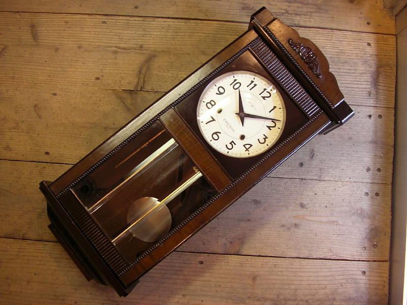 昭和初期頃の栄計舎・振り子時計・中型・（クォーツ改造）・ダイヤガラス小窓付きが入荷しました。